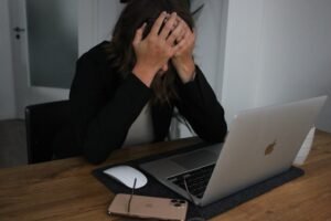 frustrated busness women at her computer