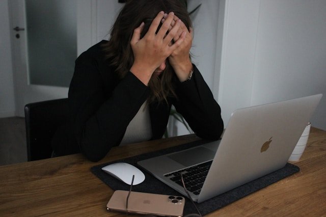 frustrated busness women at her computer